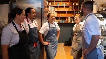 Chefs chatting in the kitchen